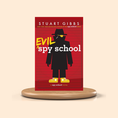 Book cover of 'Evil Spy School' by Stuart Gibbs on a beige background