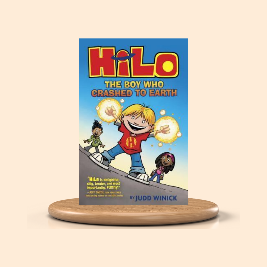 Book titled 'Hilo: The Boy Who Crashed to Earth' by Judd Winick on a wooden stand with a beige background