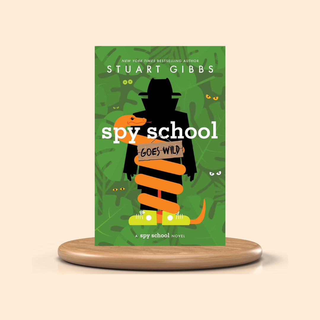 Book cover of 'Spy School Goes Wild' by Stuart Gibbs on a green background with a wooden stand.