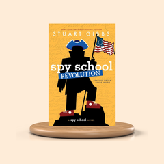 Book cover of 'Spy School Revolution' by Stuart Gibbs on a yellow background